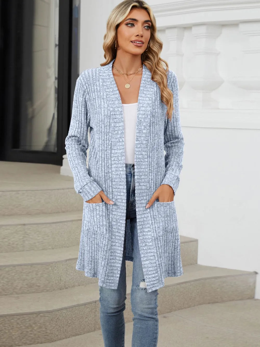 Autumn and winter long color long sleeved loose pocket cardigan jacket for women