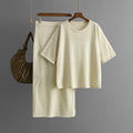 Hollow out short sleeved knitted top half skirt two-piece set women's solid color casual set